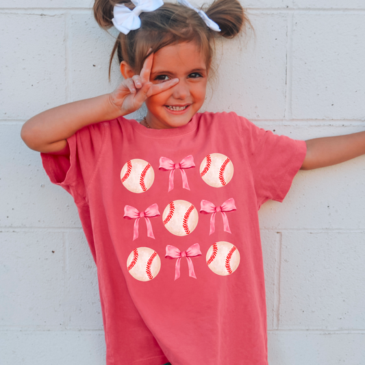 Youth Baseballs And Pink Bow Coquette  Comfort Color Graphic Tee