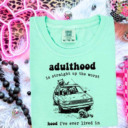 Adulthood Is The Worst Hood Comfort Color Graphic Tee